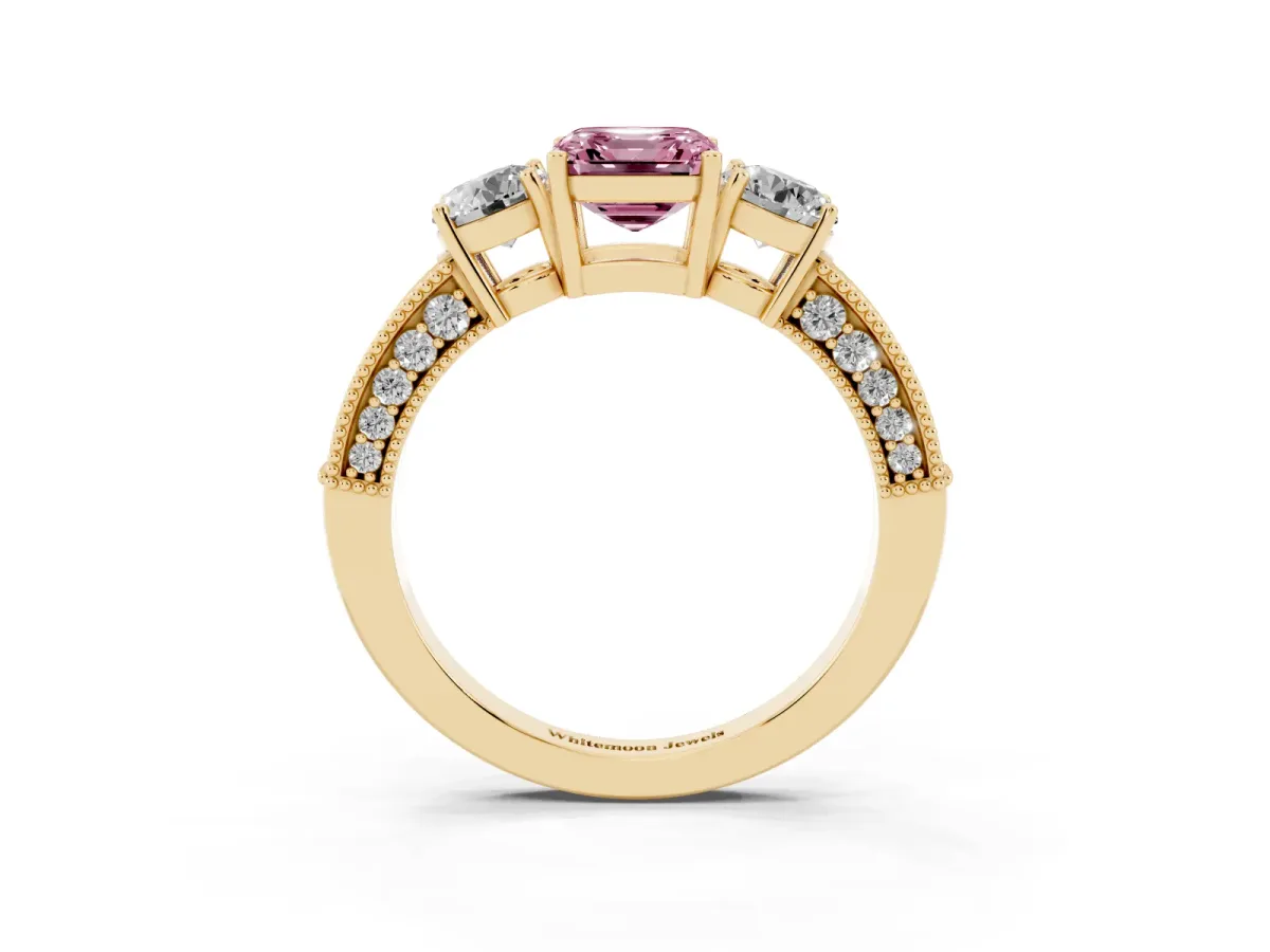 Fancy Pink Asscher Cut Three-Stone Diamond Ring with Pavé Band and Four-Prong Setting Yellow gold
