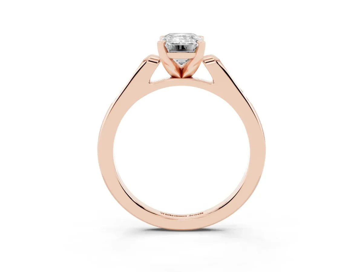 Emerald Cut Diamond Solitaire Ring with Channel Set Round Band and Prong Setting Rose gold