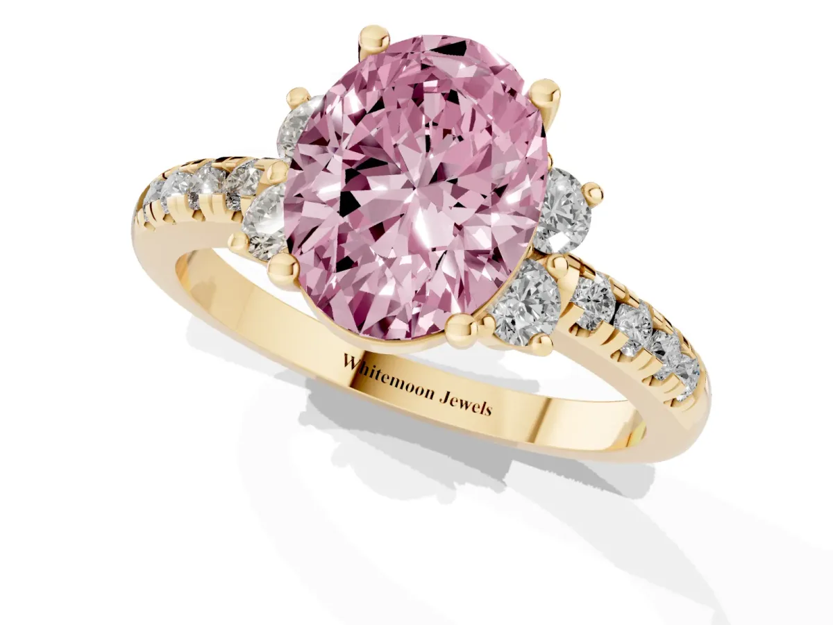 Fancy Pink Oval Cut Diamond Three-Stone Pave Band with Four-Prong Setting Yellow gold