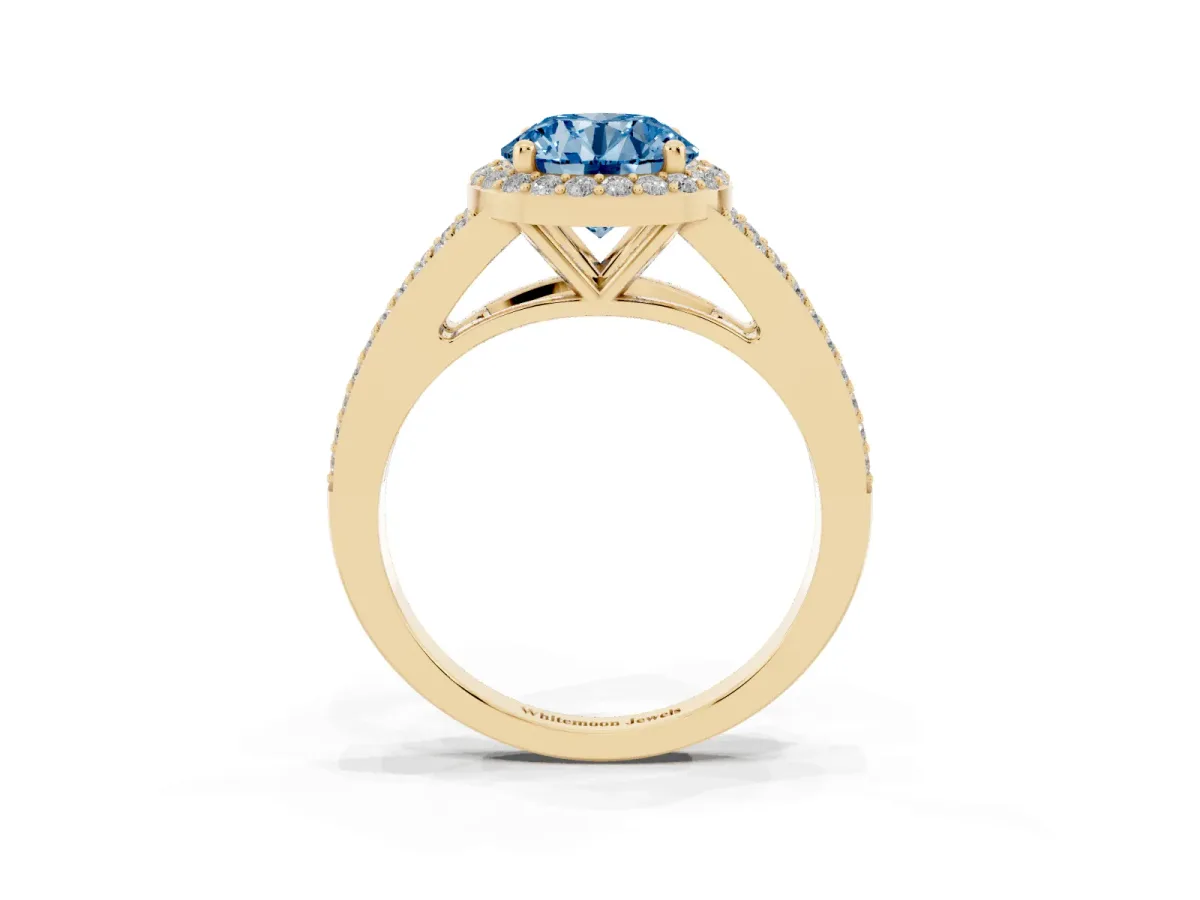 Fancy Blue Round Cut Halo Split Shank Pave Diamond Ring with Four-Prong Setting Yellow gold