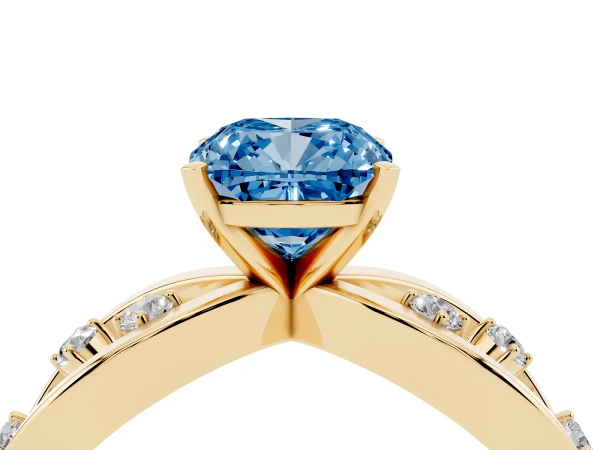 Fancy Blue Cushion Cut Cut Solitaire Diamond with Side Stones on Criss-Cross Band and Four-Prong Setting Yellow gold
