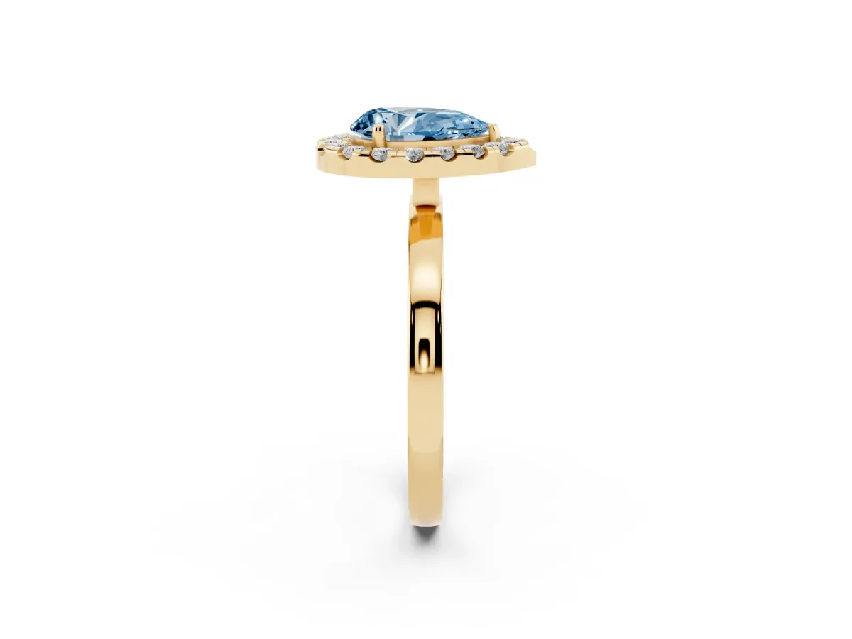 Fancy Blue Pear Cut Halo Diamond Solitaire with Pavé Band and Four-Prong Setting Yellow gold