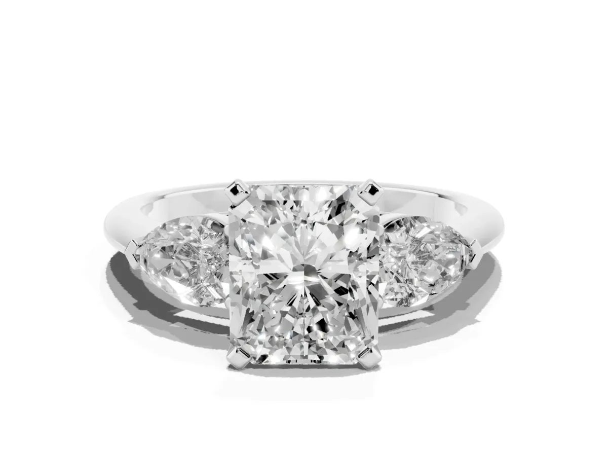 Three-Stone Radiant Cut Diamond Ring with Pear Side Stones and Four-Prong Setting Platinum
