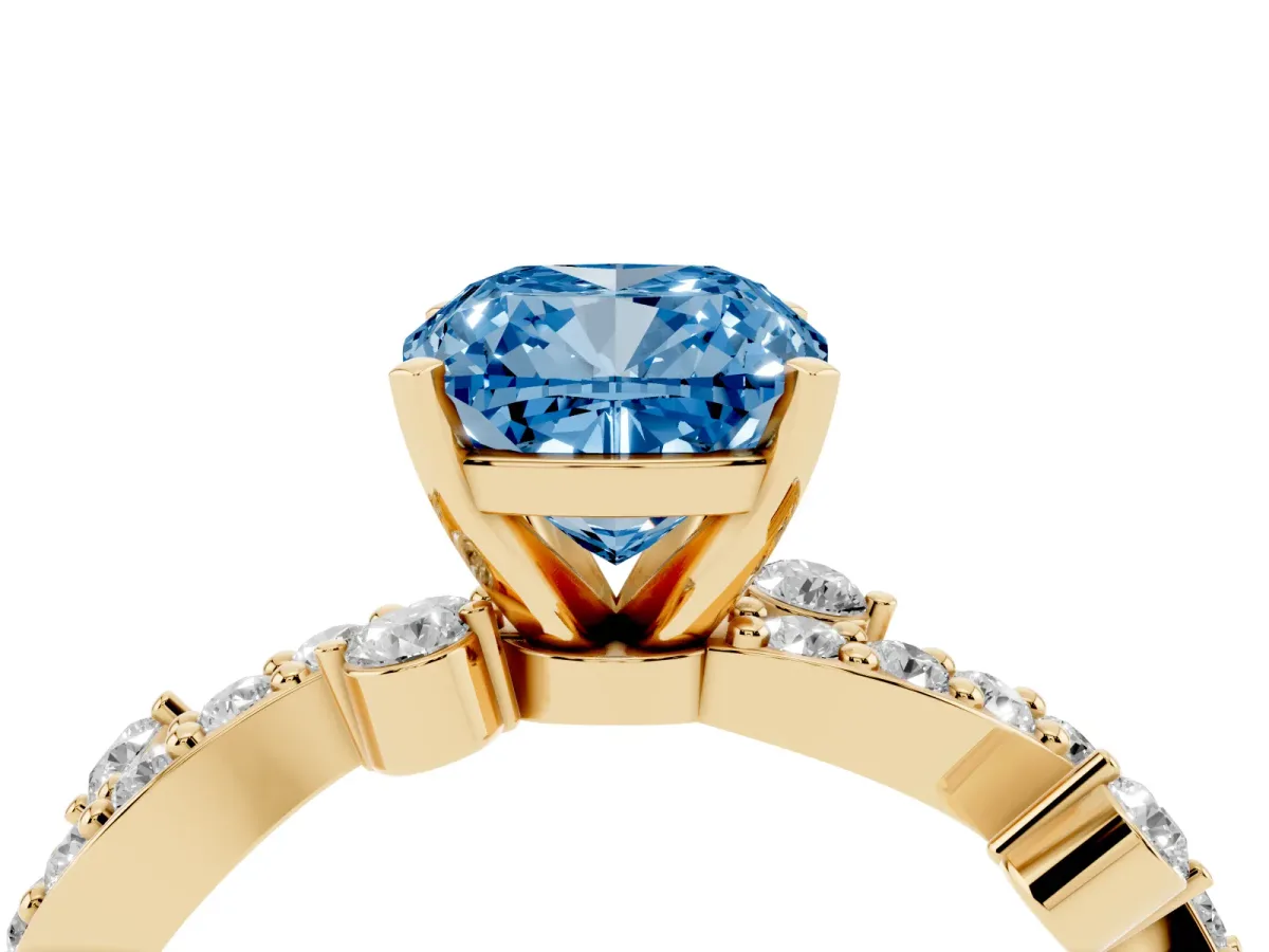 Fancy Blue Cushion Cut Cut Solitaire Diamond Twisted Band with Pave Setting Yellow gold