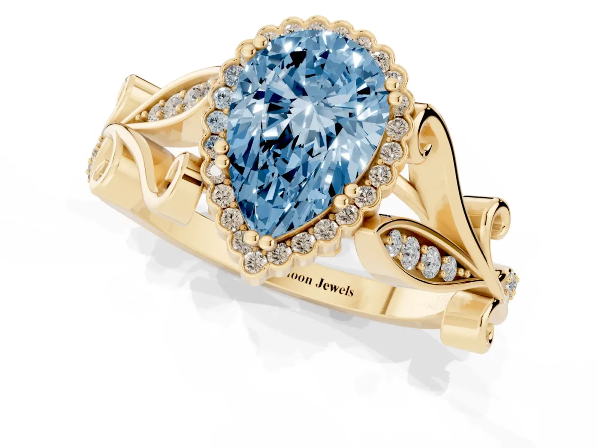 Fancy Blue Pear Cut Diamond Halo Ring with Vintage Split Shank and Four-Prong Setting Yellow gold