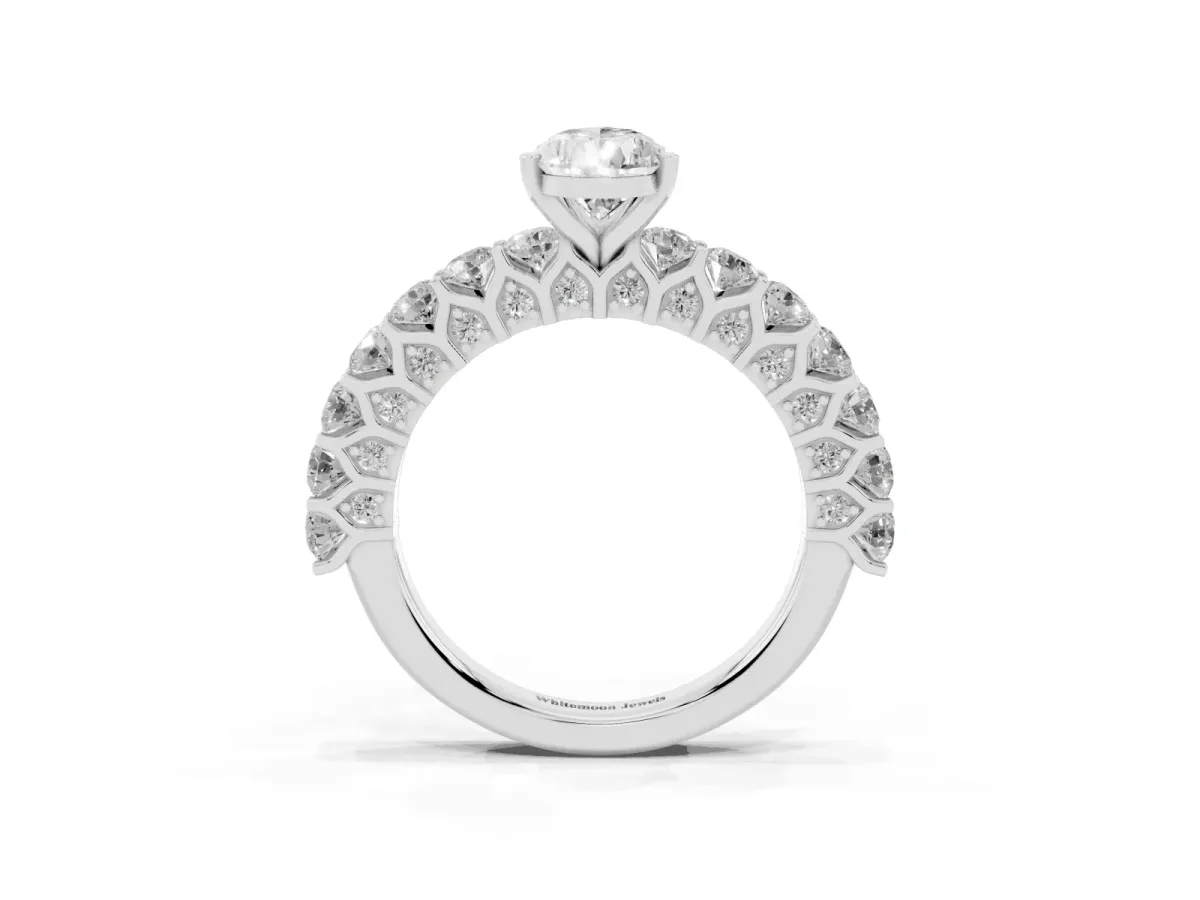 Pear Cut Diamond Solitaire Ring with Shared Prong Pavé Band and Four-Prong Setting Silver