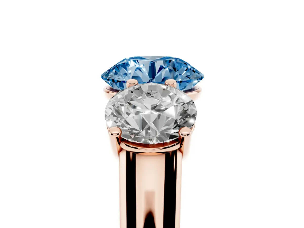 Fancy Blue Round Cut Three-Stone Diamond Ring with Prong Setting on a Classic Band Rose gold