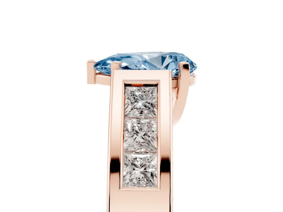 Fancy Blue Pear Cut Cut Channel Set Solitaire Ring with Four-Prong Setting Rose gold