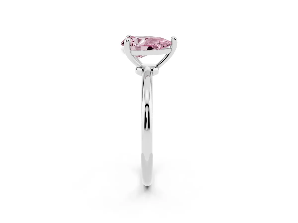 Fancy Pink Pear Cut Solitaire Diamond Ring with 4-Prong Setting on a Classic Band Silver