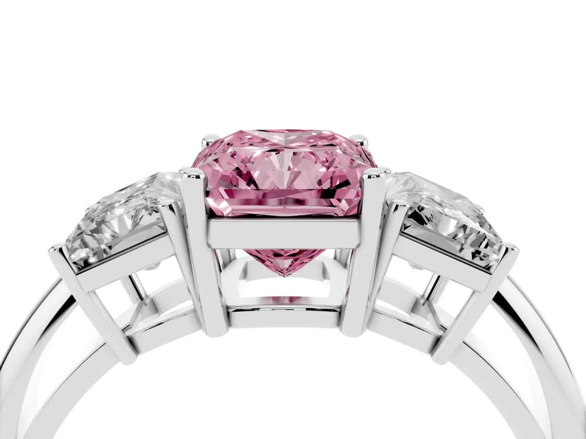 Fancy Pink Three-Stone Radiant Cut Cut Diamond Engagement Ring with Prong Setting on a White Gold Band Platinum