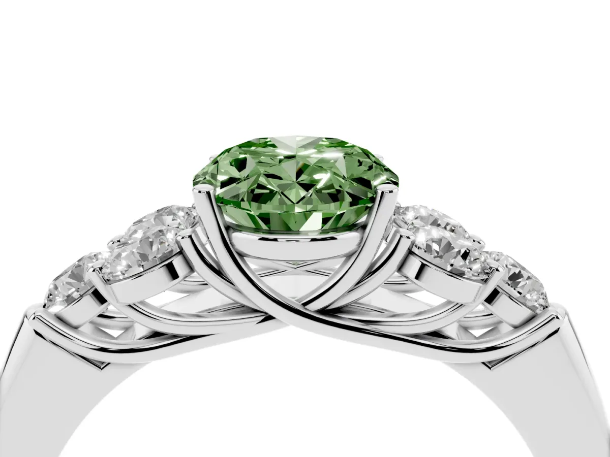 Fancy Green Oval Cut Cut Diamond Cluster Ring with Round Accent Stones and Prong Setting on a Classic Band White gold