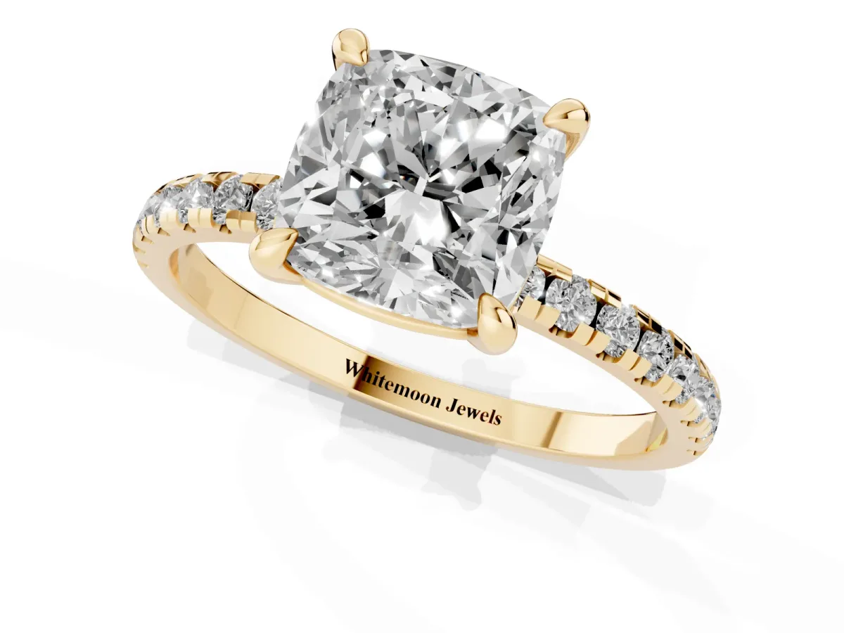 Cushion Cut Diamond Brilliant Solitaire Ring with Pavé Band and Four-Prong Setting Yellow gold