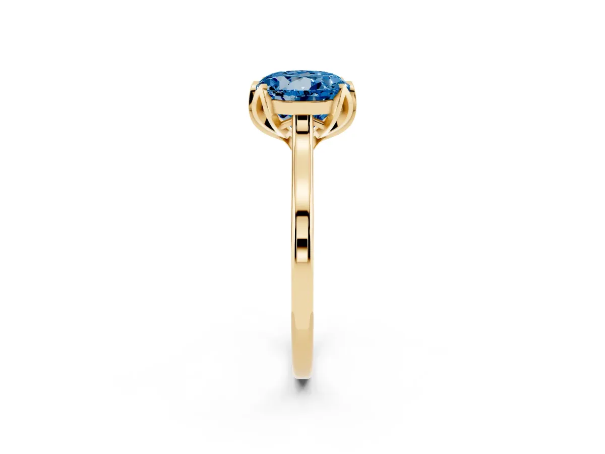 Fancy Blue Round Cut Diamond Solitaire Ring with Flower Prong Setting and Classic Band Yellow gold