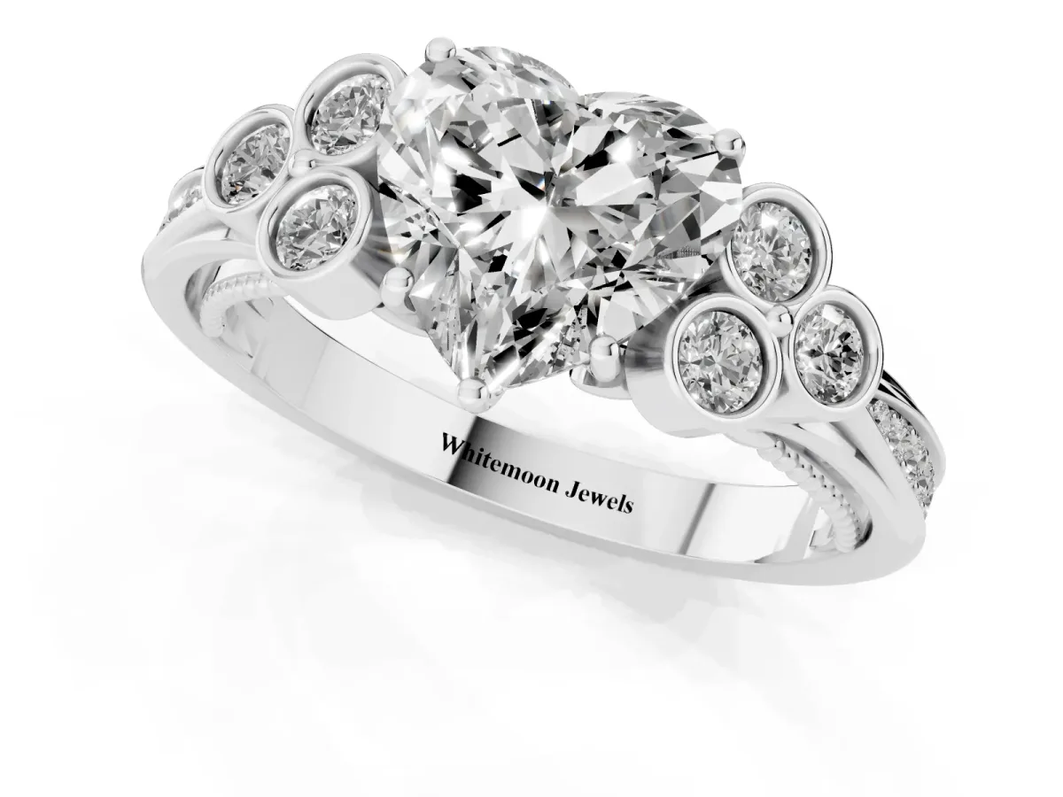 Heart Cut Cut Diamond Engagement Ring with Bezel Set Round Side Stones and Prong Setting Silver
