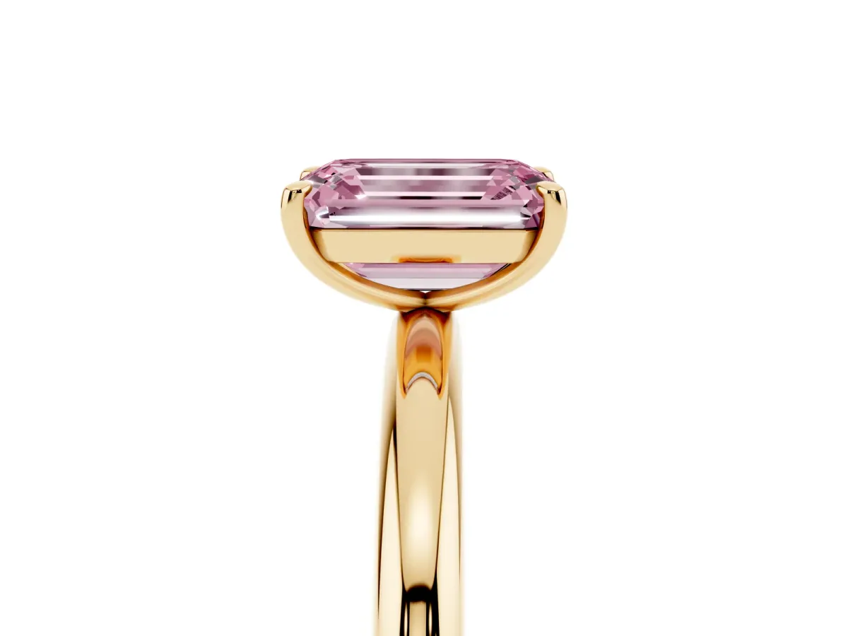Fancy Pink Emerald Cut Solitaire Diamond Ring with Four-Prong Setting on a Plain Band Yellow gold