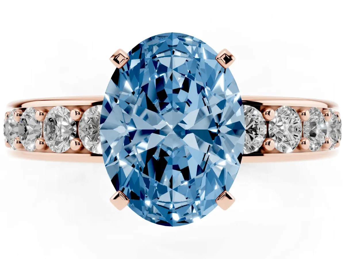 Fancy Blue Oval Cut Diamond Engagement Ring with Channel Set Round Band and Prong Setting Rose gold