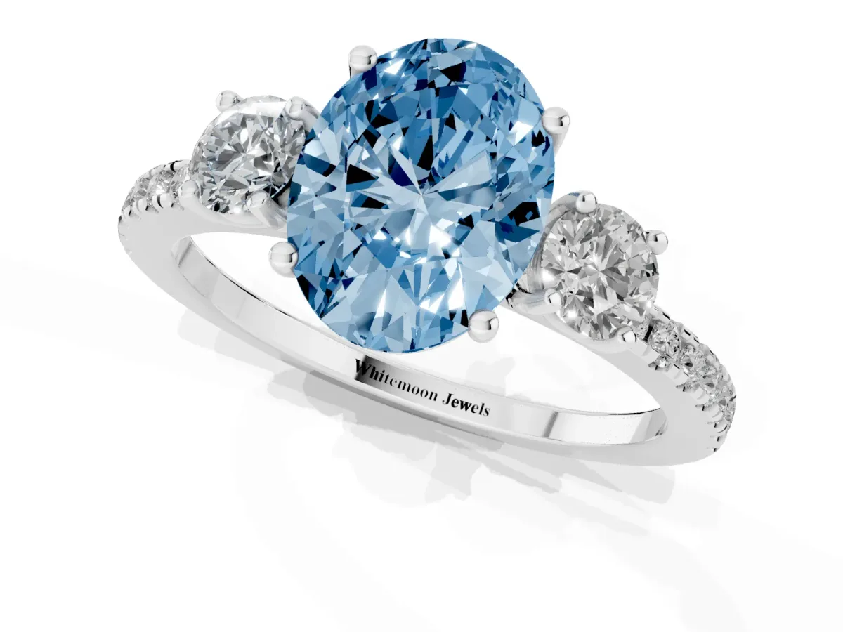Fancy Blue Three-Stone Oval Cut Cut Diamond Pavé Band with Prong Setting Platinum
