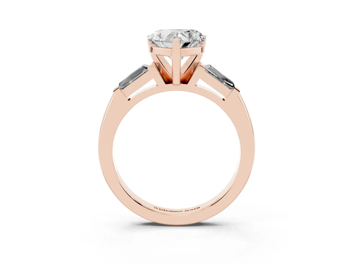 Heart Cut Solitaire with Tapered Baguette Side Stones on a Classic Band with Four-Prong Setting Rose gold