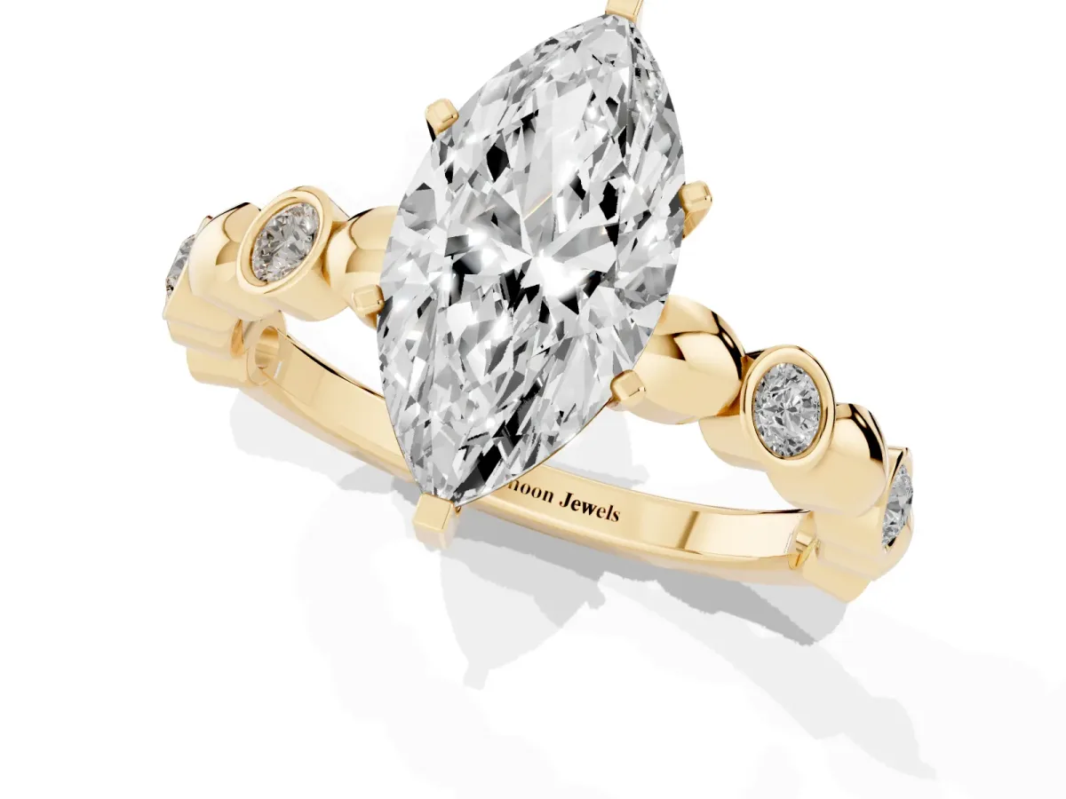 Marquise Cut Solitaire Bezel-Set Diamond Ring with Beaded Band and Four-Prong Setting Yellow gold