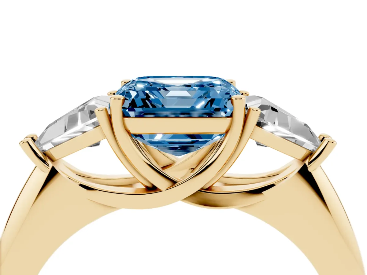 Fancy Blue Three-Stone Asscher Cut Diamond Engagement Ring with Trillion Side Stones and Prong Setting Yellow gold