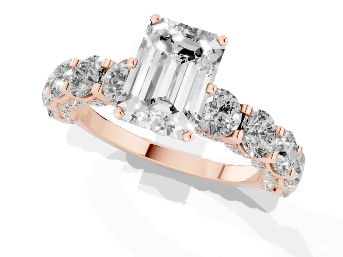 Emerald Cut Diamond Side Stone Engagement Ring with Four-Prong Setting Rose gold
