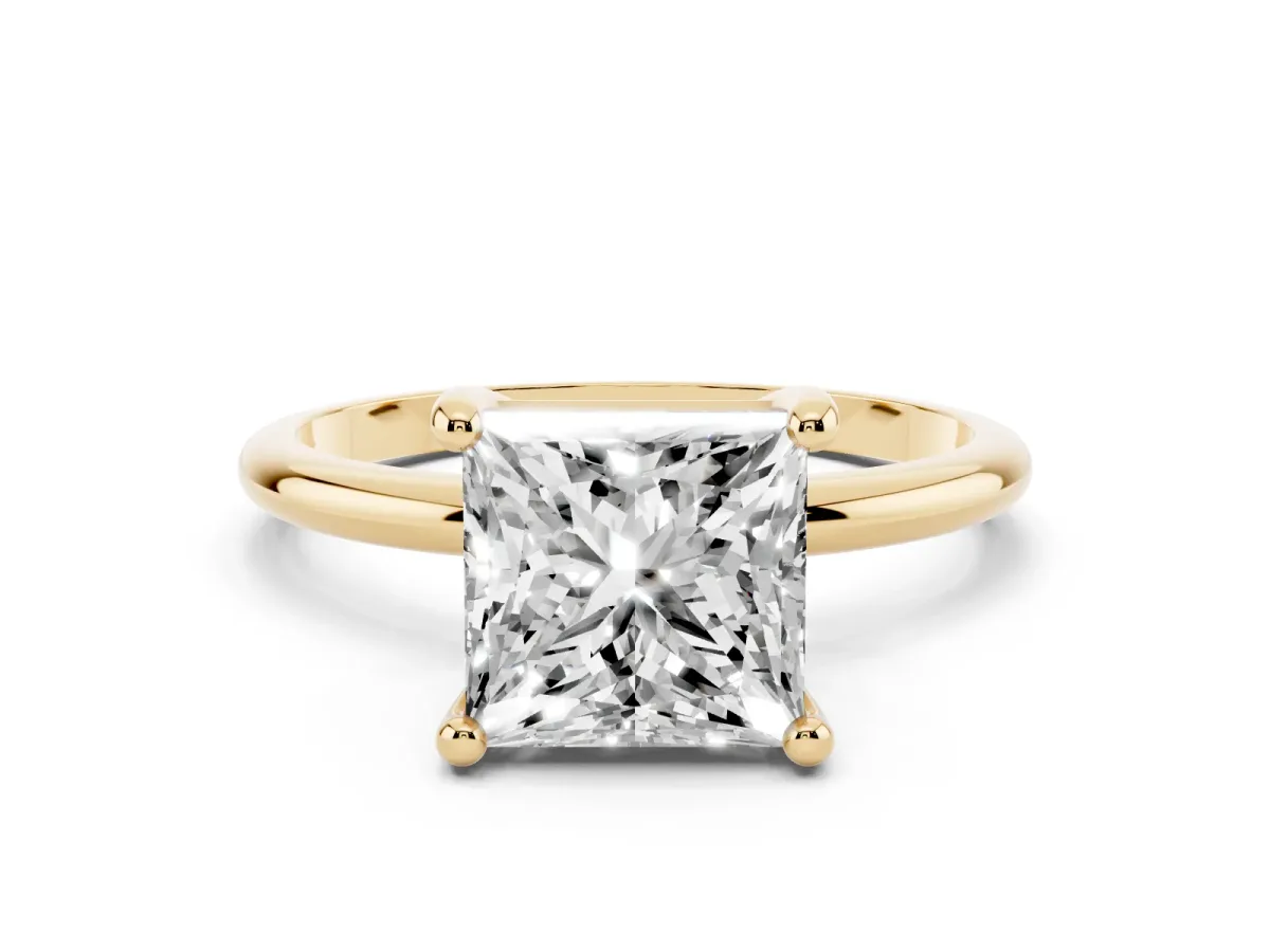 Princess Cut Solitaire Diamond Ring with 4-Prong Setting on a Classic Band Yellow gold