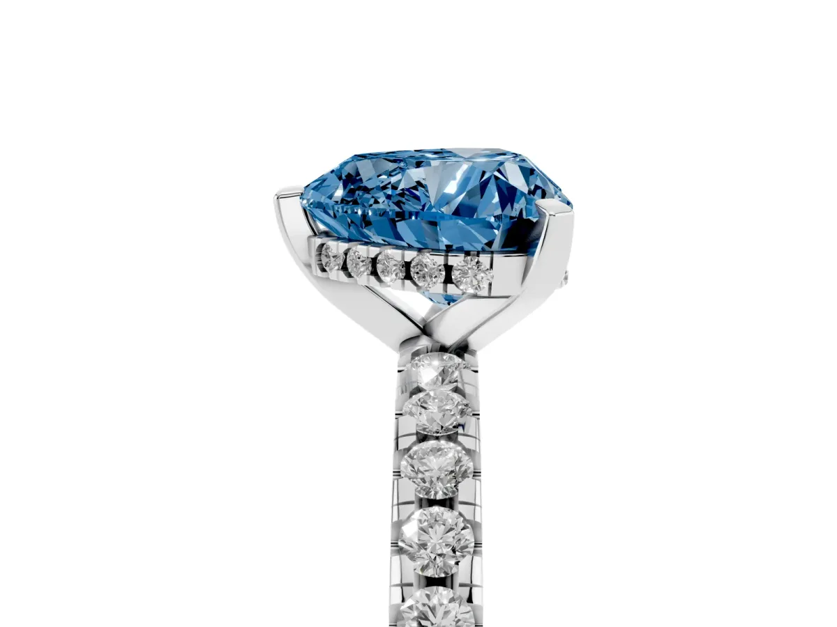Fancy Blue Heart Cut Diamond Solitaire Ring with Round Pavé Band and Four-Prong Setting Silver