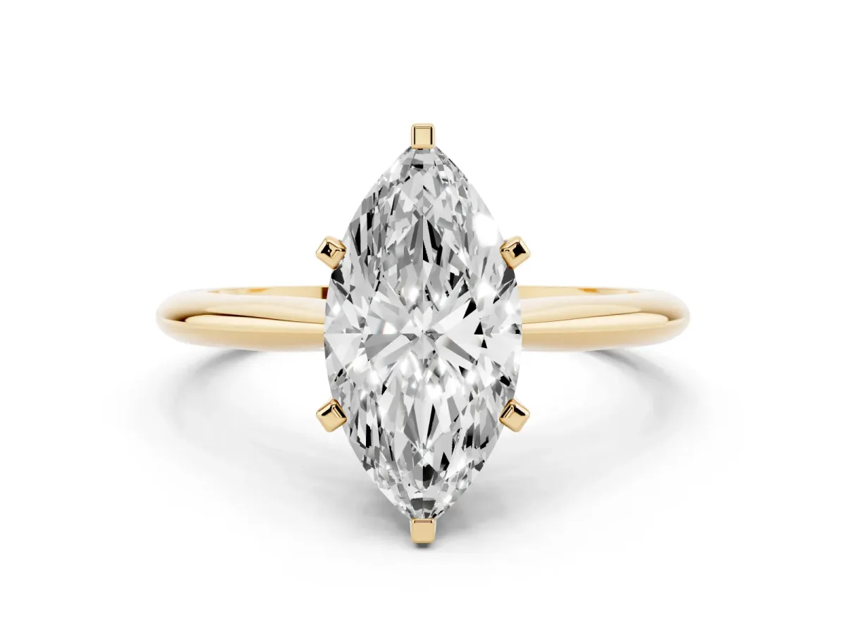 Marquise Cut Cut Solitaire Ring with Four-Prong Setting on a Classic Band Yellow gold