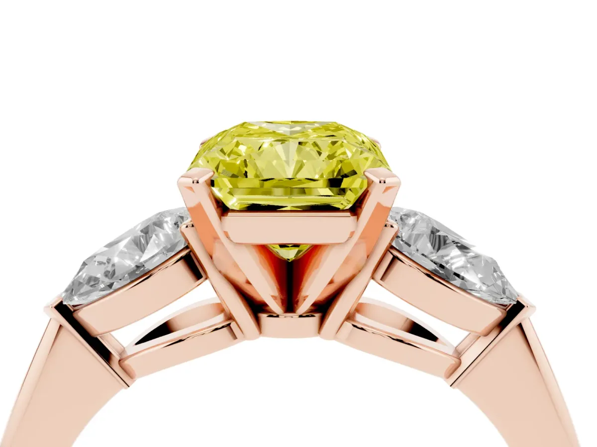 Fancy Yellow Three-Stone Radiant Cut Diamond Ring with Pear Side Stones and Four-Prong Setting Rose gold