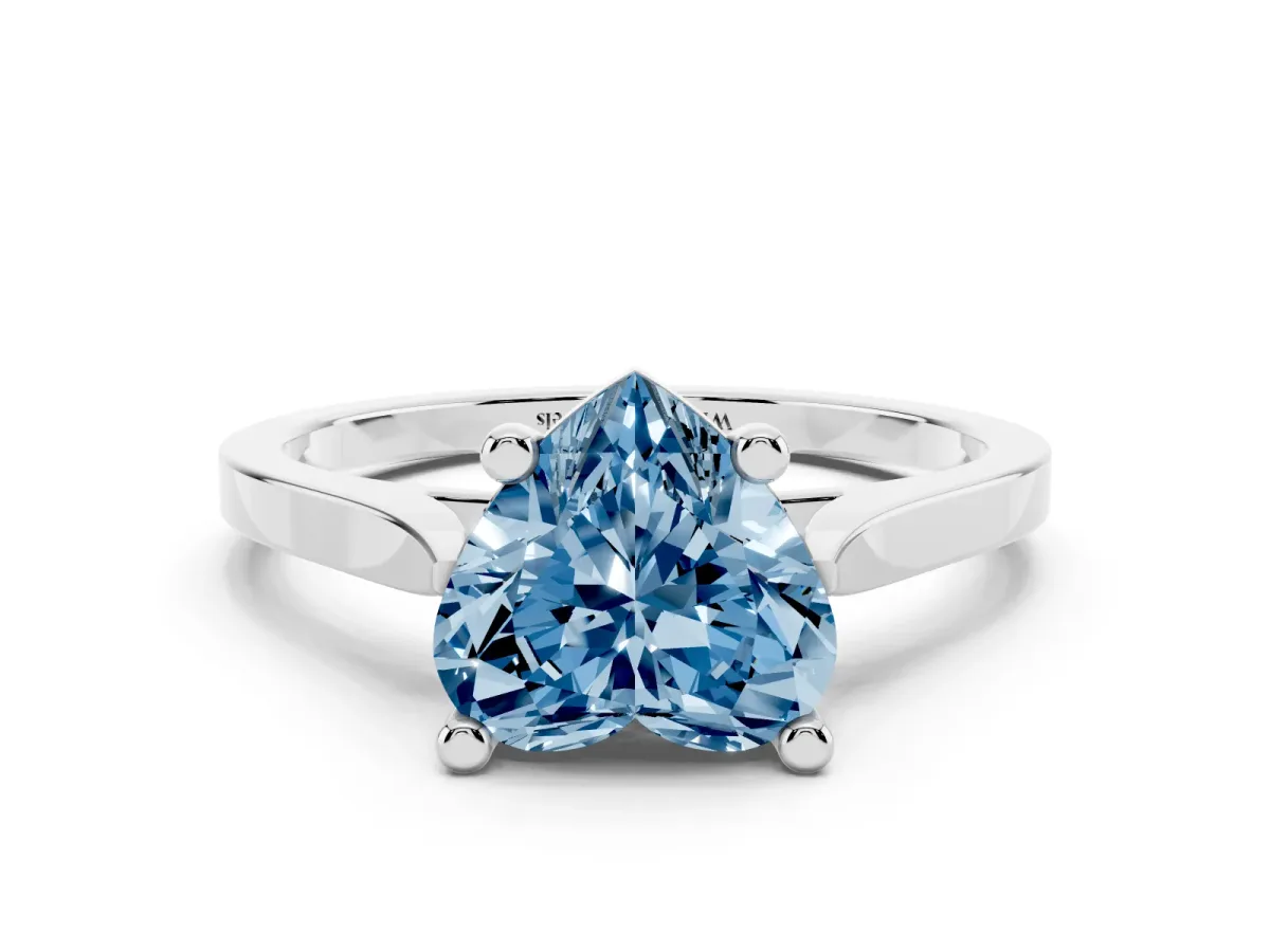 Fancy Blue Heart Cut Solitaire Diamond Ring with Four-Prong Setting and Tapered Band Platinum