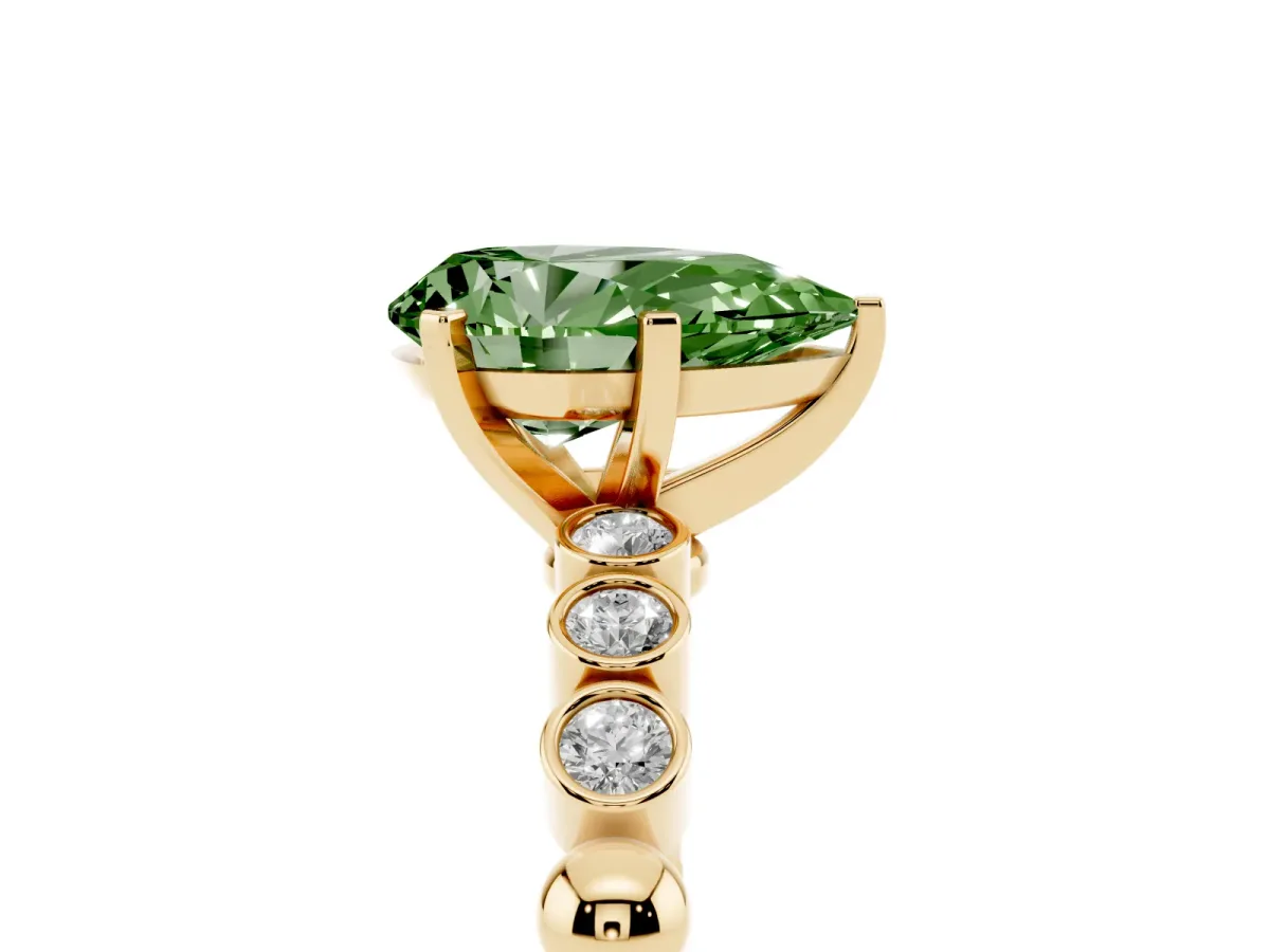 Fancy Green Pear Cut Solitaire Bezel Accent Diamond Engagement Ring with Beaded Band and Four-Prong Setting Yellow gold
