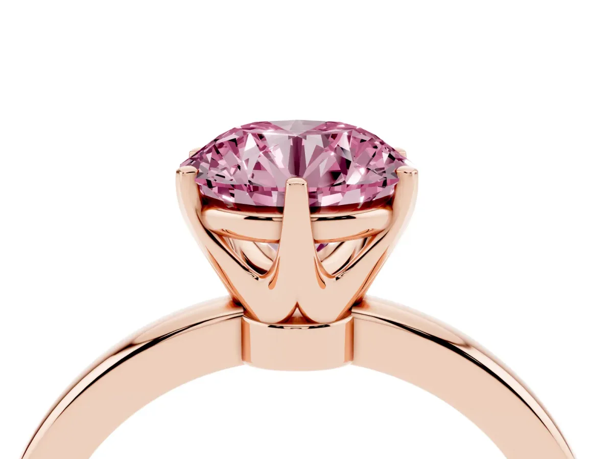 Fancy Pink Round Cut Solitaire Diamond Ring with Six-Prong Setting on a Classic Band Rose gold