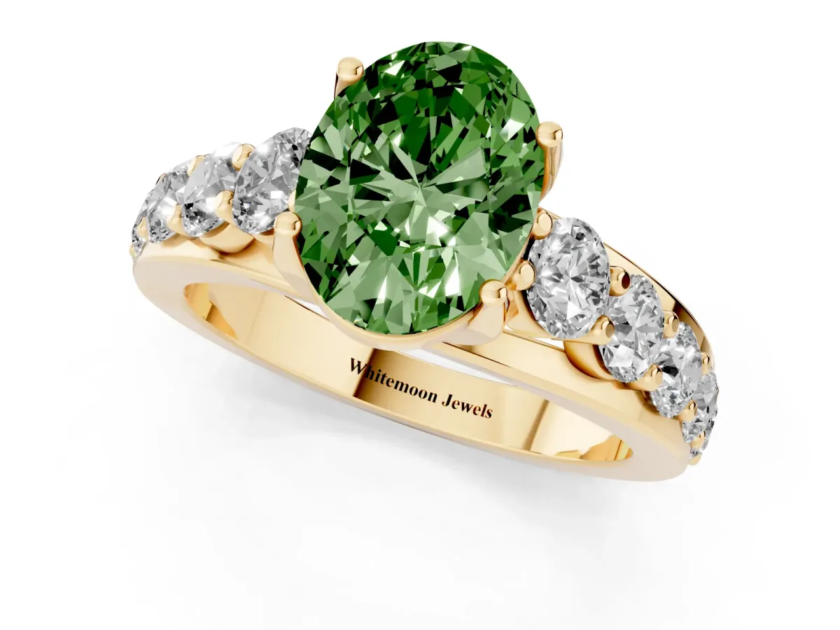 Fancy Green Oval Cut Diamond Engagement Ring with Pavé Band and Four-Prong Setting Yellow gold
