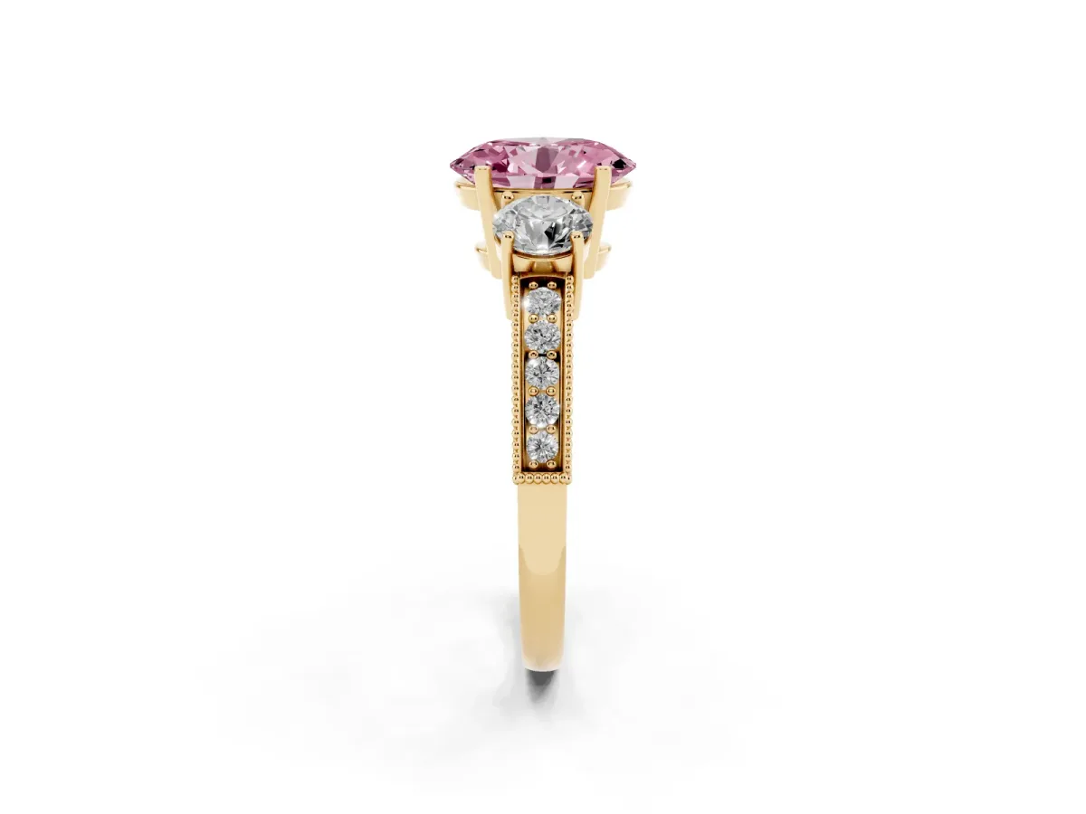 Fancy Pink Oval Cut Three-Stone Diamond Ring with Pavé Band and Four-Prong Setting Yellow gold