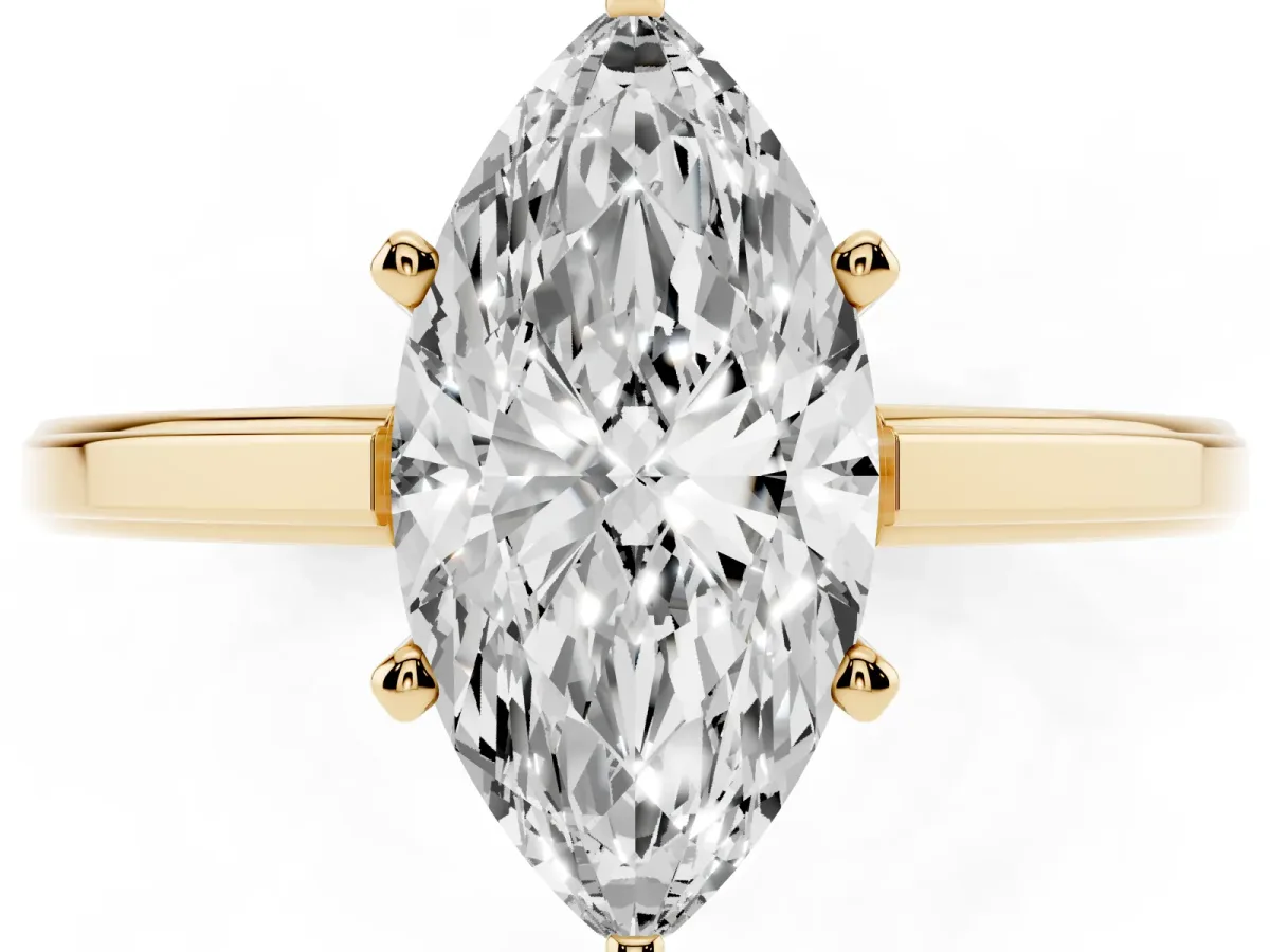 Marquise Cut Solitaire Diamond Ring with Four-Prong Setting and Classic Band Yellow gold