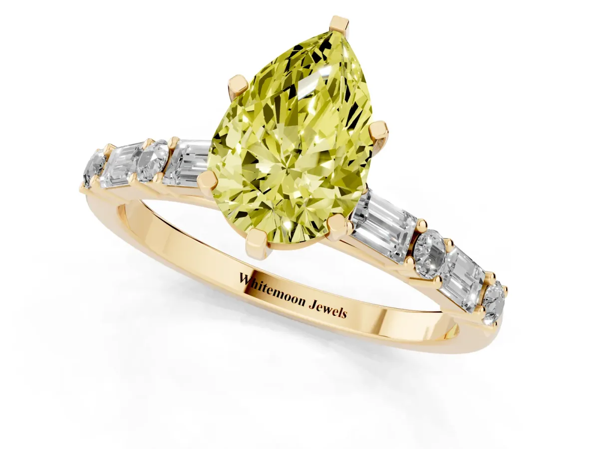 Fancy Yellow Pear Cut Diamond Solitaire with Side Baguettes and Channel Set Band Yellow gold