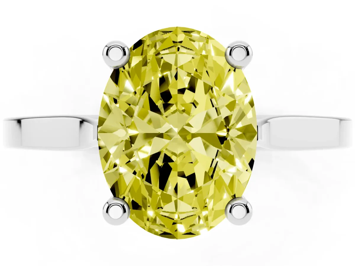 Fancy Yellow Oval Cut Solitaire Diamond Ring with Four-Prong Setting and Tapered Band Silver
