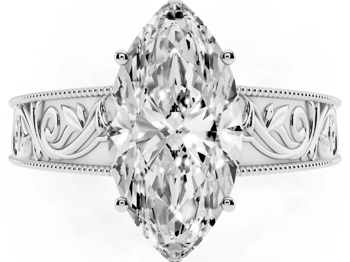Marquise Cut Diamond Solitaire Ring with Engraved Band and Four-Prong Setting Silver