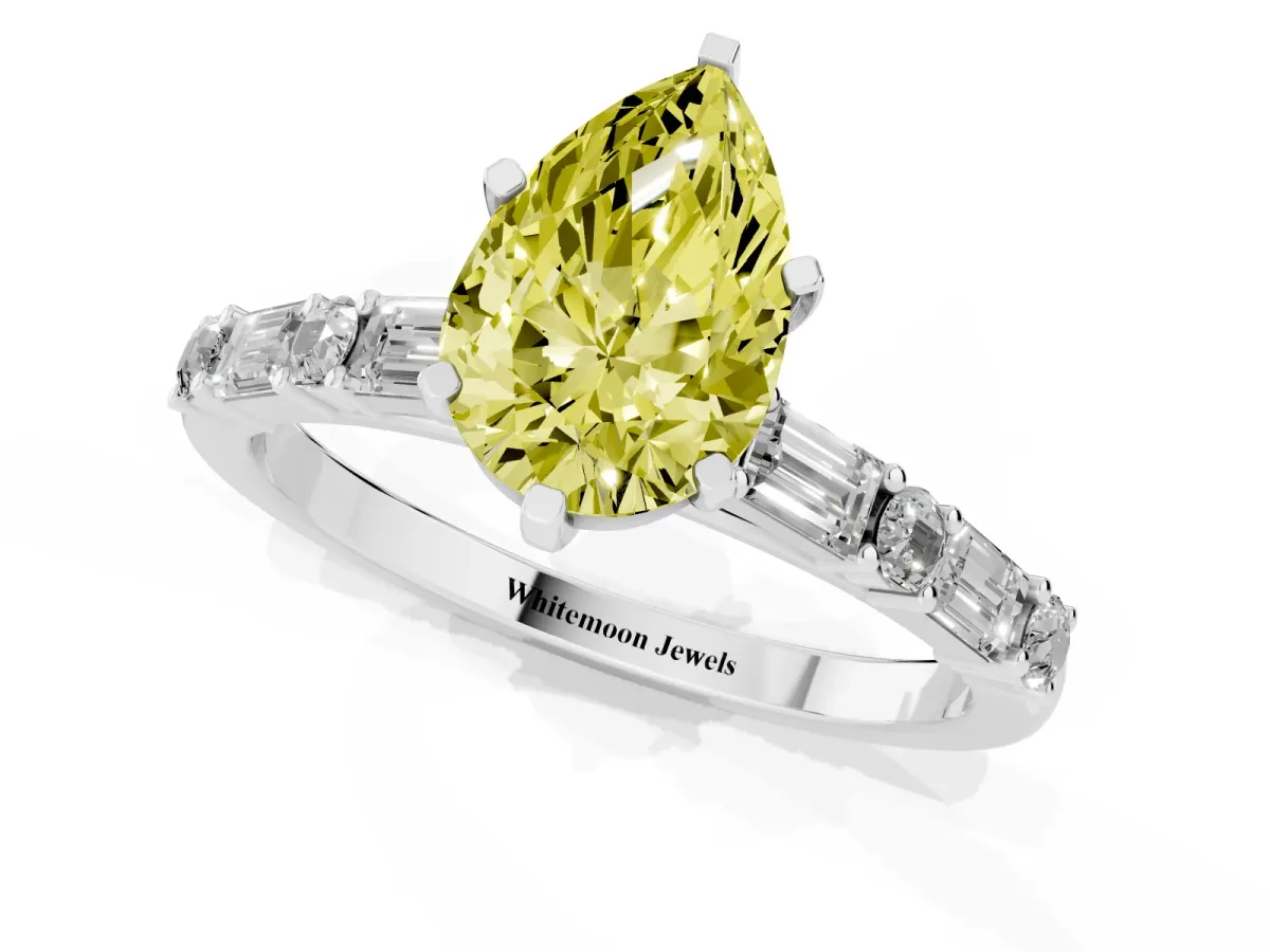 Fancy Yellow Pear Cut Diamond Solitaire with Side Baguettes and Channel Set Band Silver