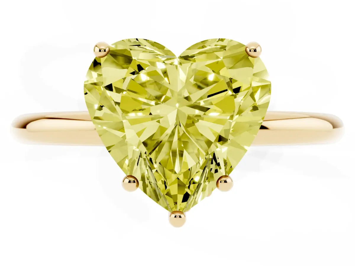Fancy Yellow Heart Cut Solitaire Diamond Ring with a Classic Band and Four-Prong Setting Yellow gold