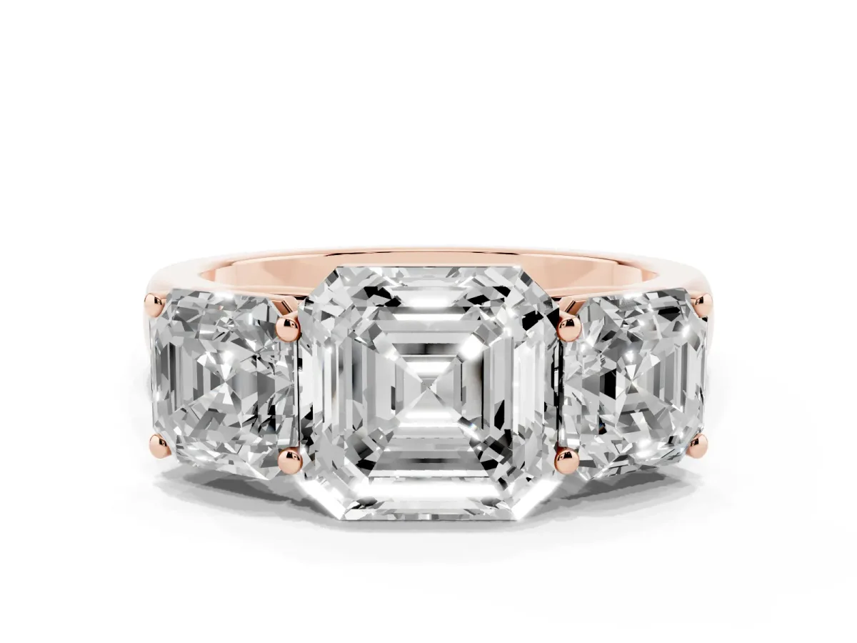 Asscher Cut Three-Stone Diamond Ring with Prong Setting on a Classic Band Rose gold
