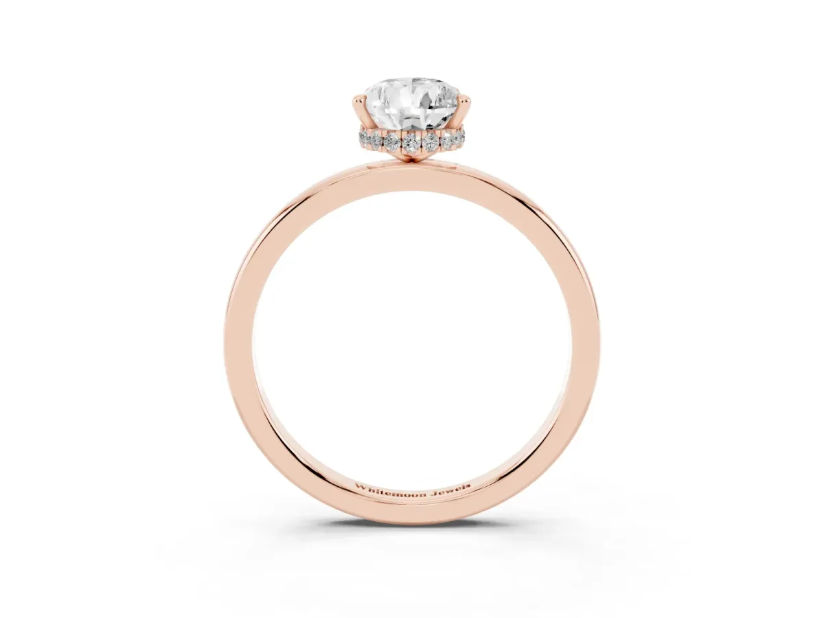 Pear Cut Solitaire Engagement Ring with Cathedral Band and Four-Prong Setting Rose gold