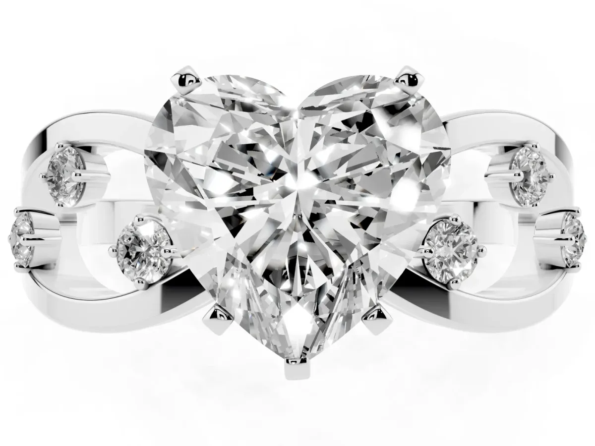 Heart Cut Cut Solitaire Diamond with Side Stones on Criss-Cross Band and Four-Prong Setting Silver