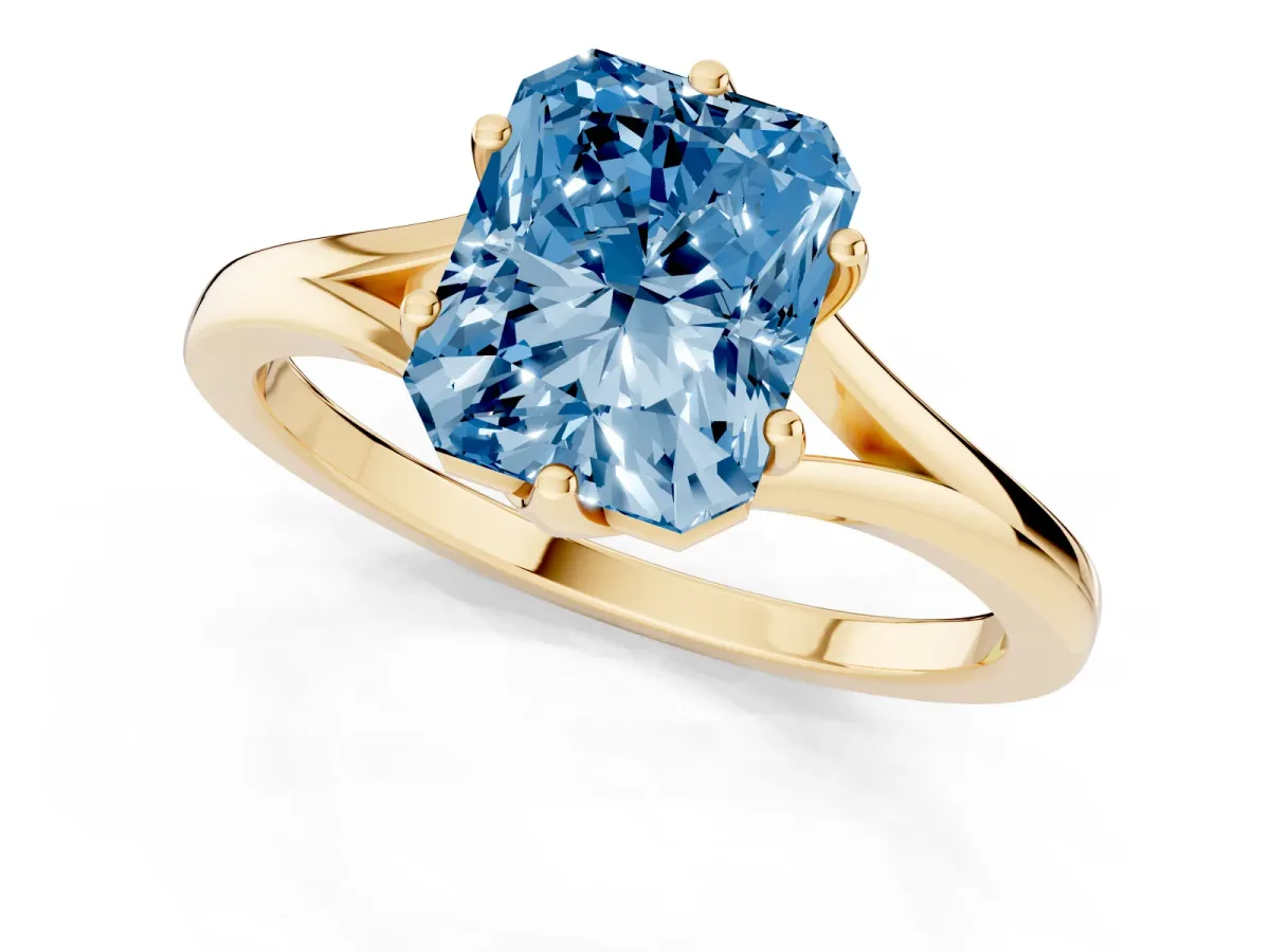 Fancy Blue Radiant Cut Solitaire Diamond Ring with Six-Prong Setting and Tapered Band Yellow gold