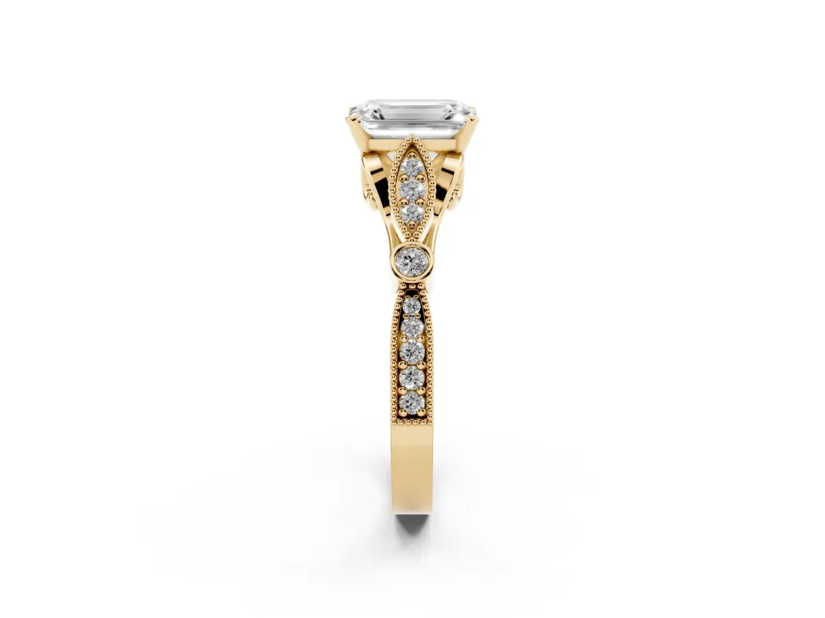 Emerald Cut Cut Diamond with Milgrain Marquise and Bezel Accents on a Solitaire Band with Prong Setting Yellow gold