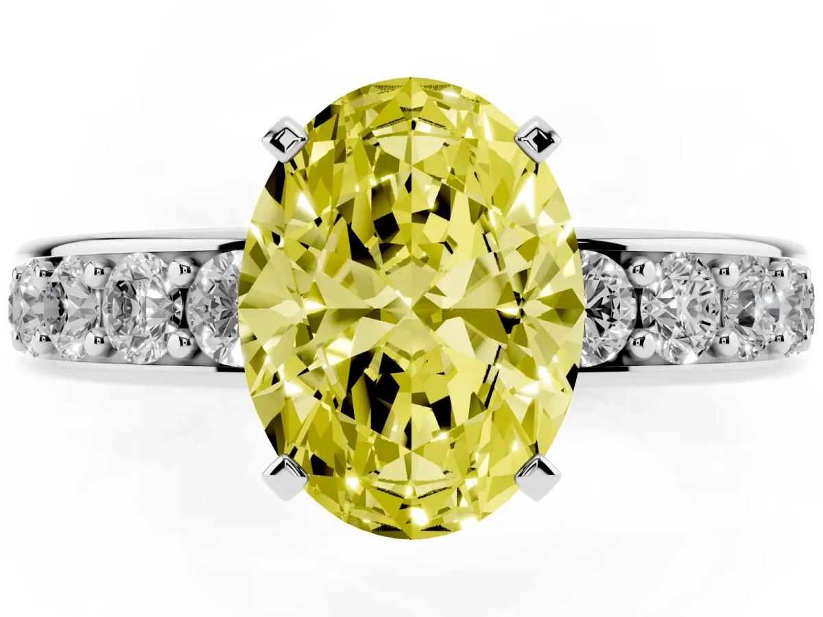 Fancy Yellow Oval Cut Diamond Engagement Ring with Channel Set Round Band and Prong Setting Silver