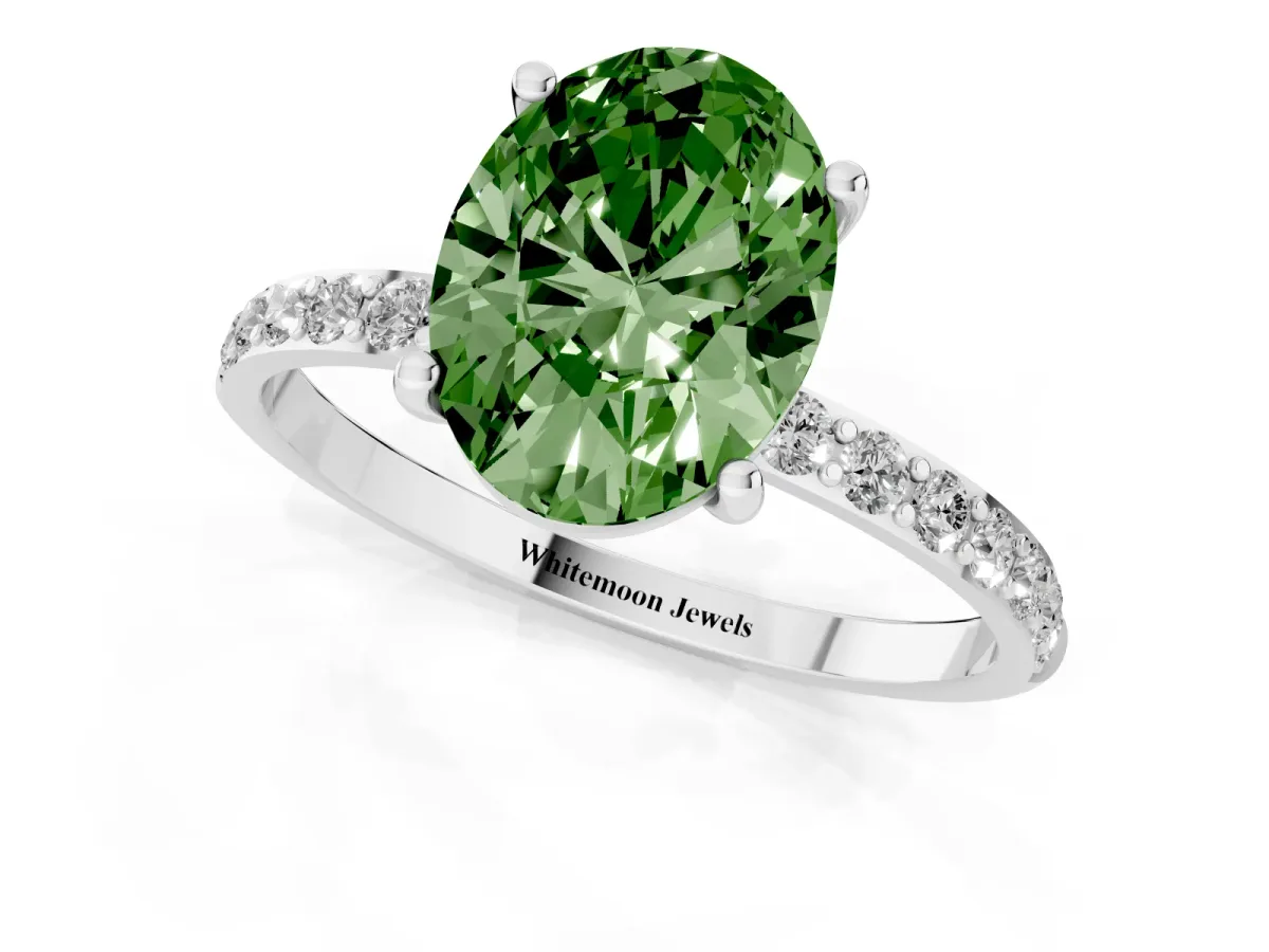 Fancy Green Oval Cut Diamond Solitaire Ring with Round Pavé Shoulders and Prong Setting Silver