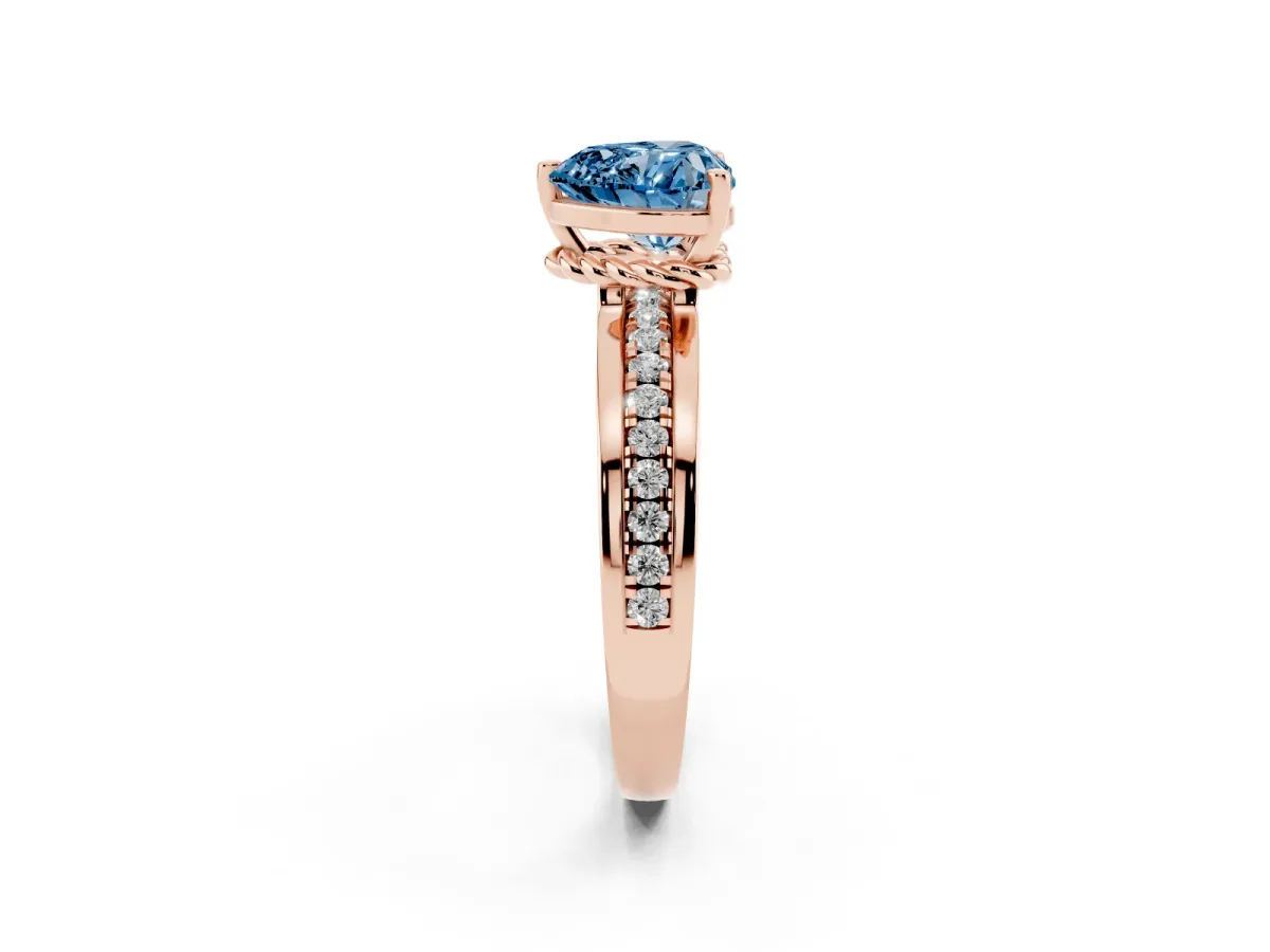 Fancy Blue Heart Cut Solitaire Diamond Ring with Channel Set Band and Six-Prong Setting Rose gold