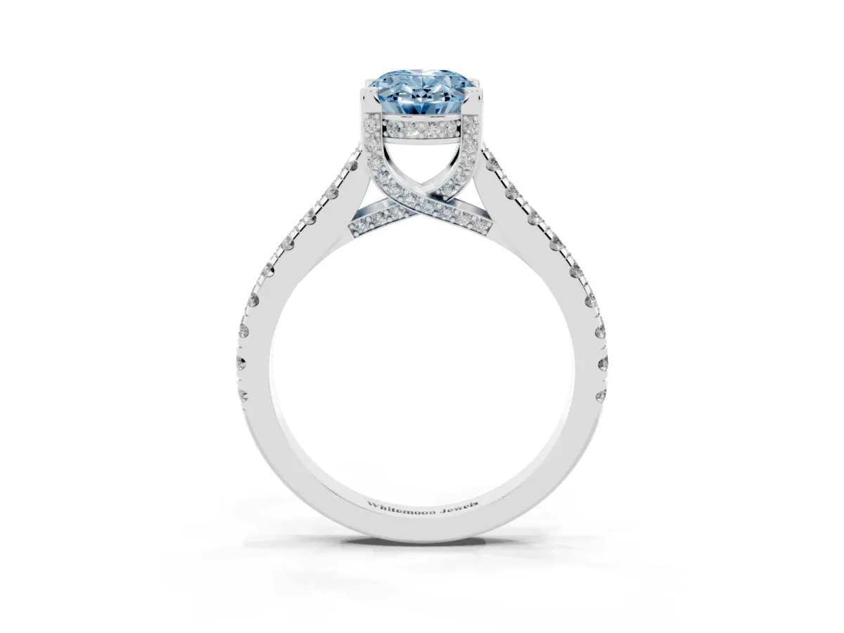 Fancy Blue Oval Cut Brilliant Diamond Solitaire with Pavé Band and Four-Prong Setting Platinum