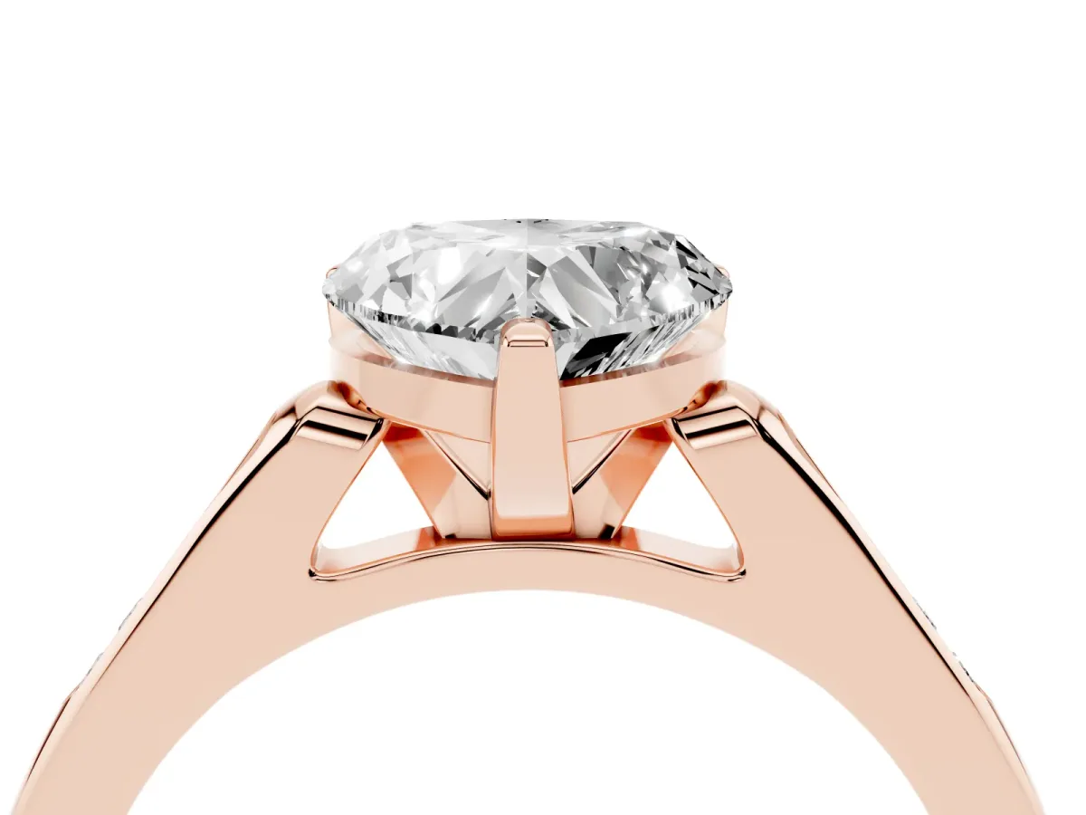 Heart Cut Diamond Solitaire Ring with Channel Set Round Band and Prong Setting Rose gold